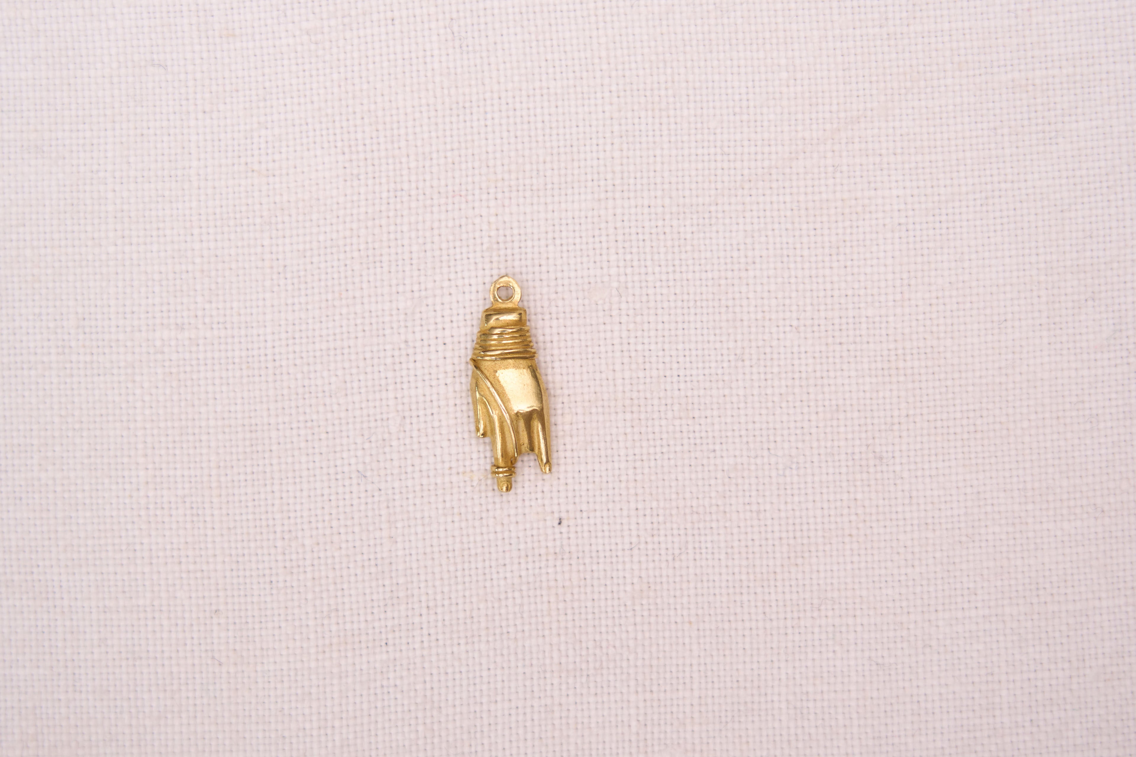 Hand charm