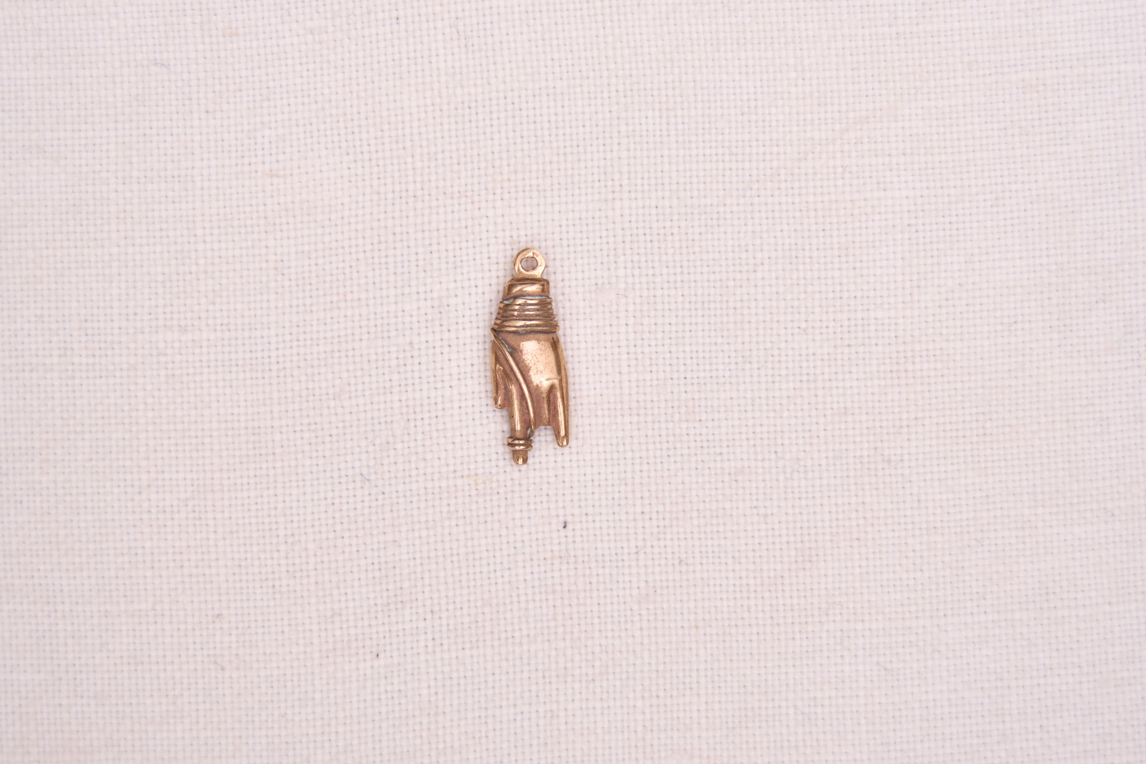 Hand charm