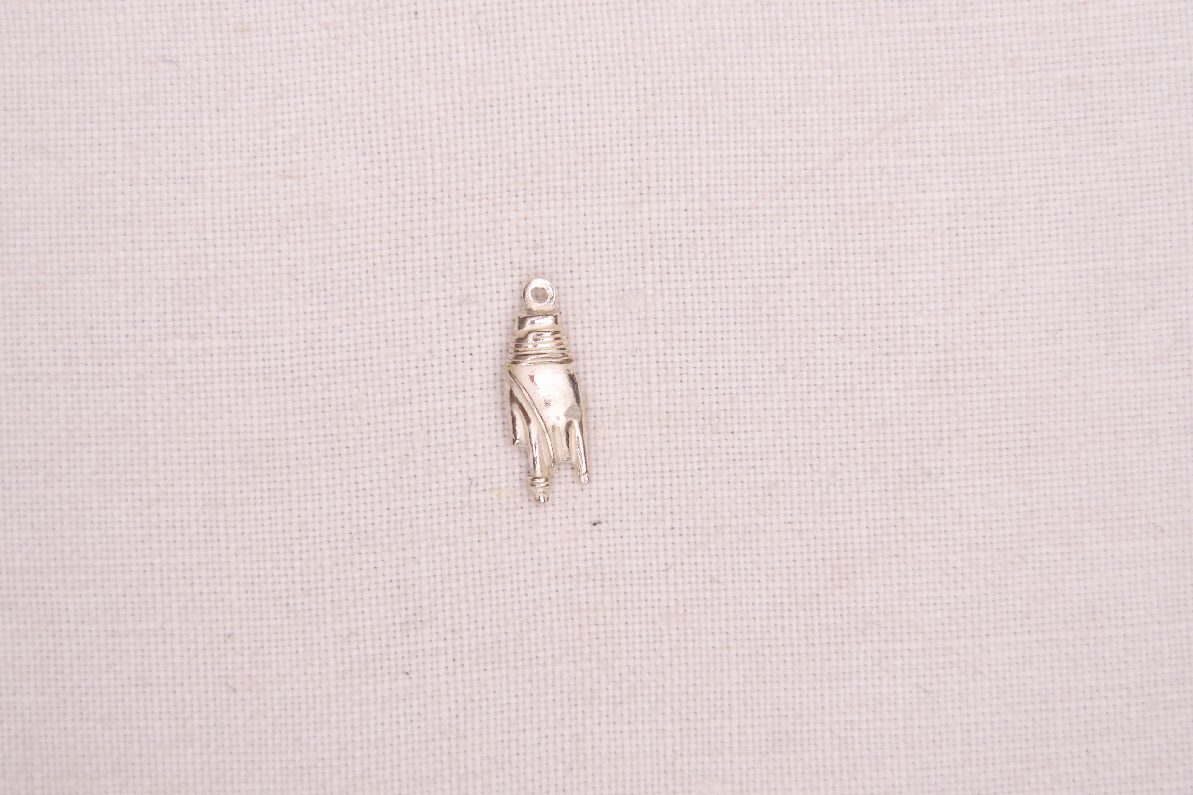 Hand charm