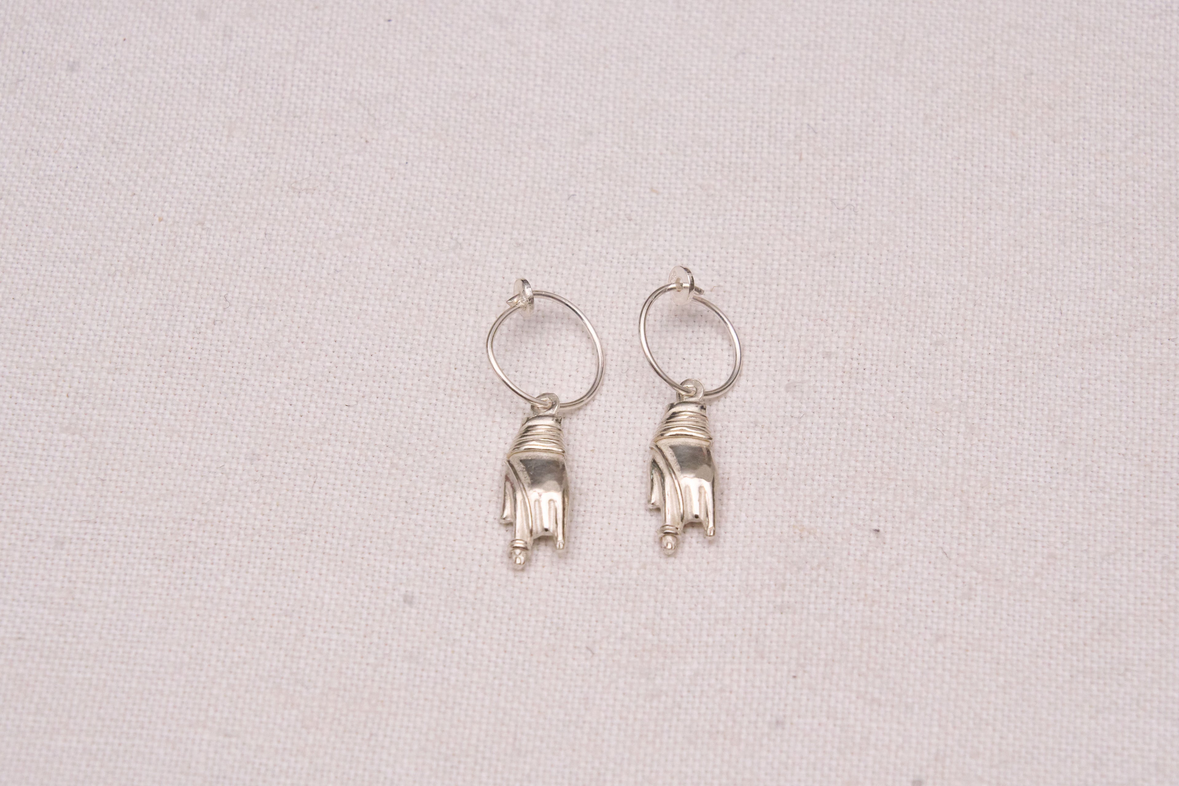 Hand charm