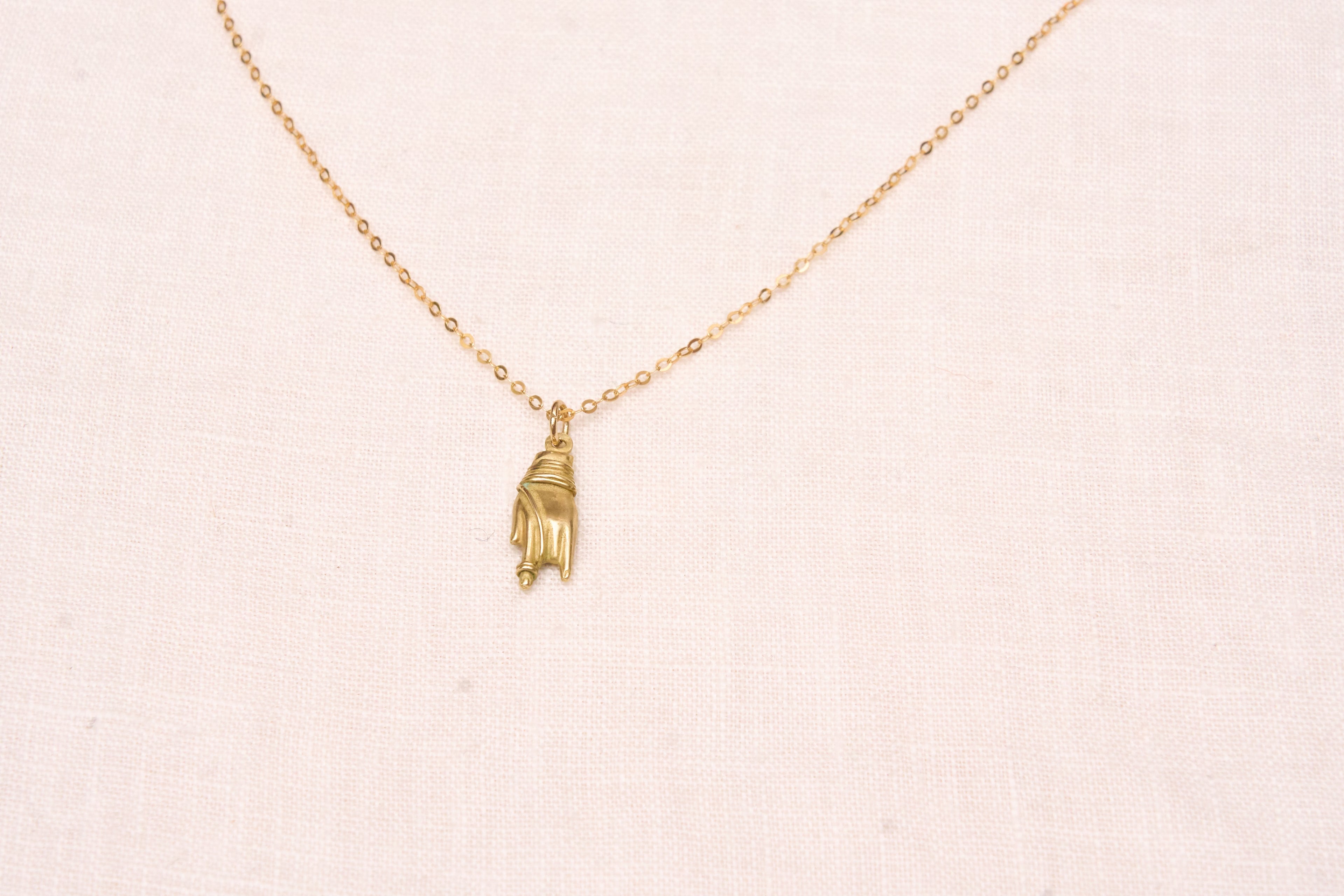 Hand charm