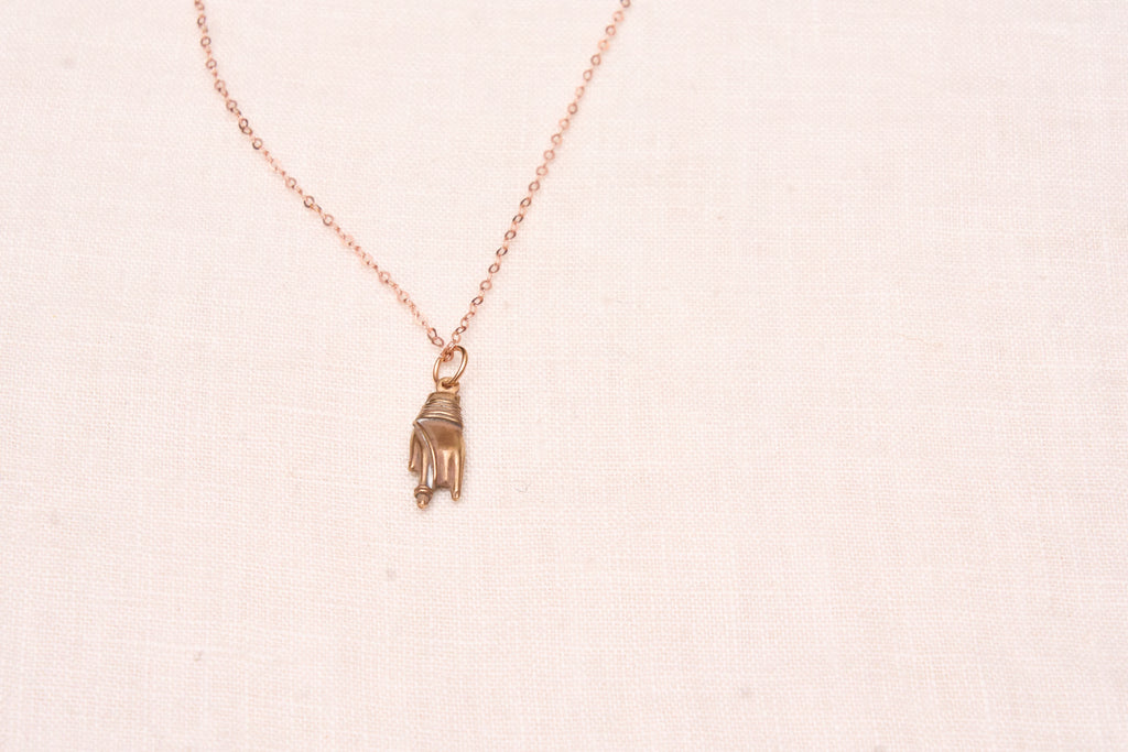 Hand charm