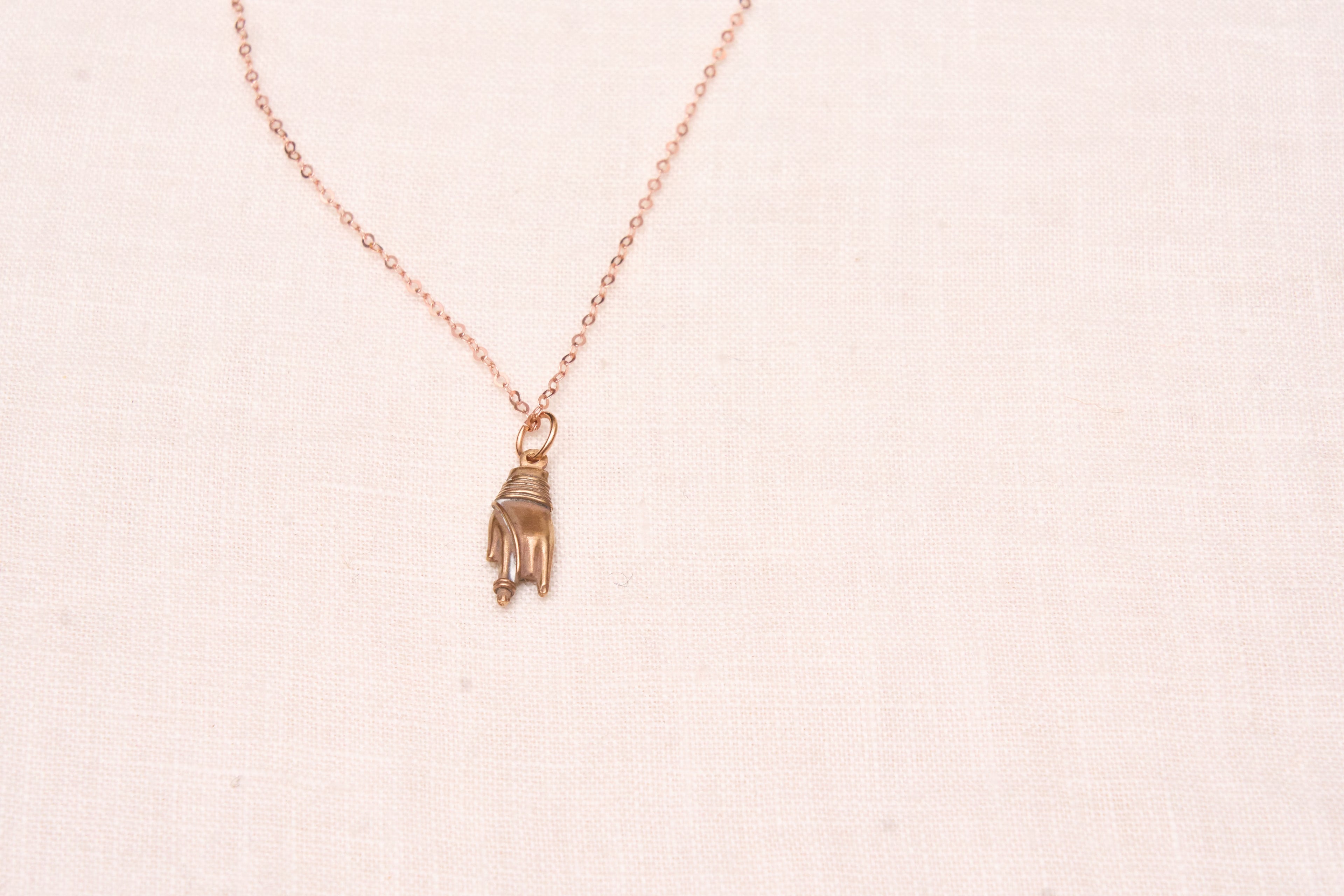 Hand charm