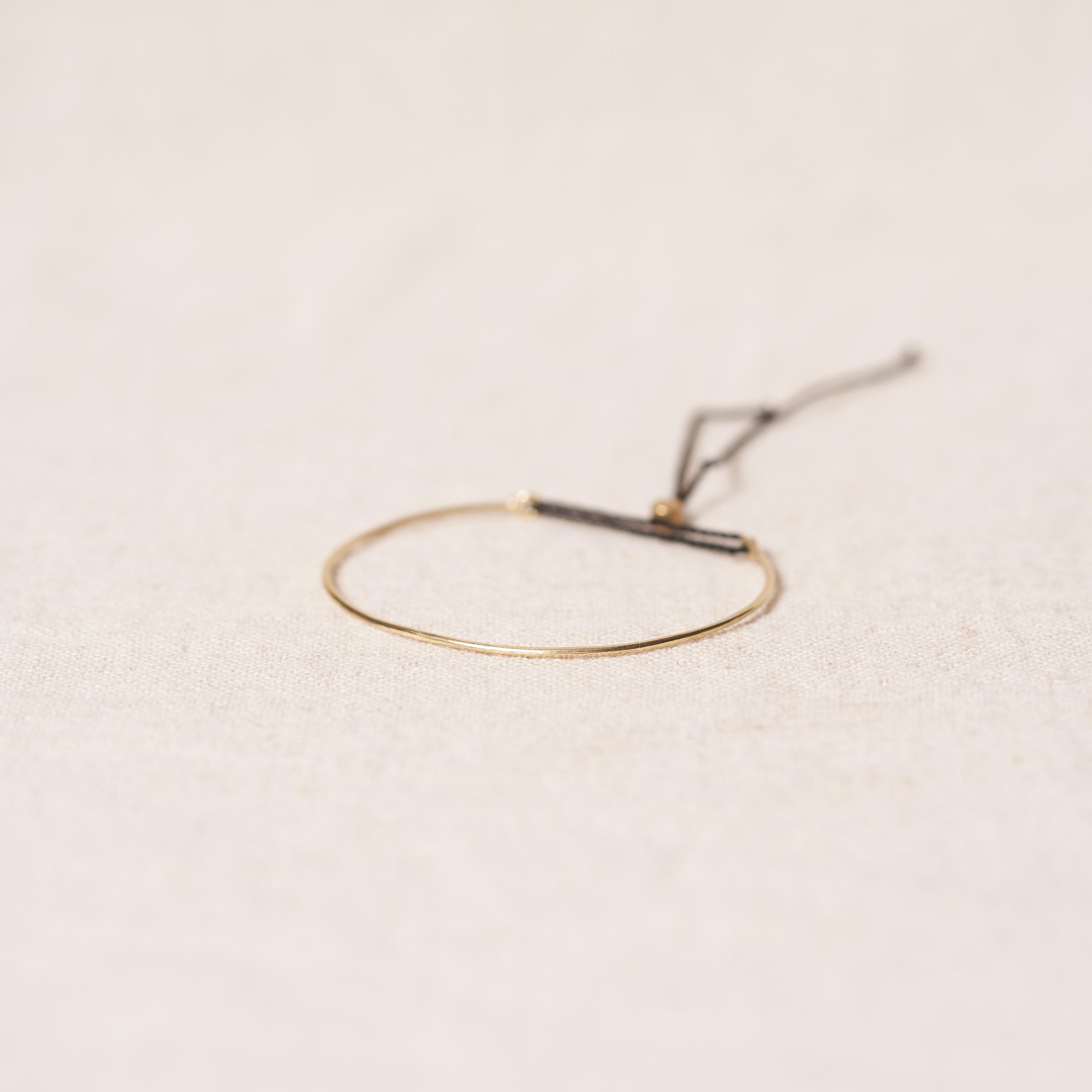 Open bracelet in bronze
