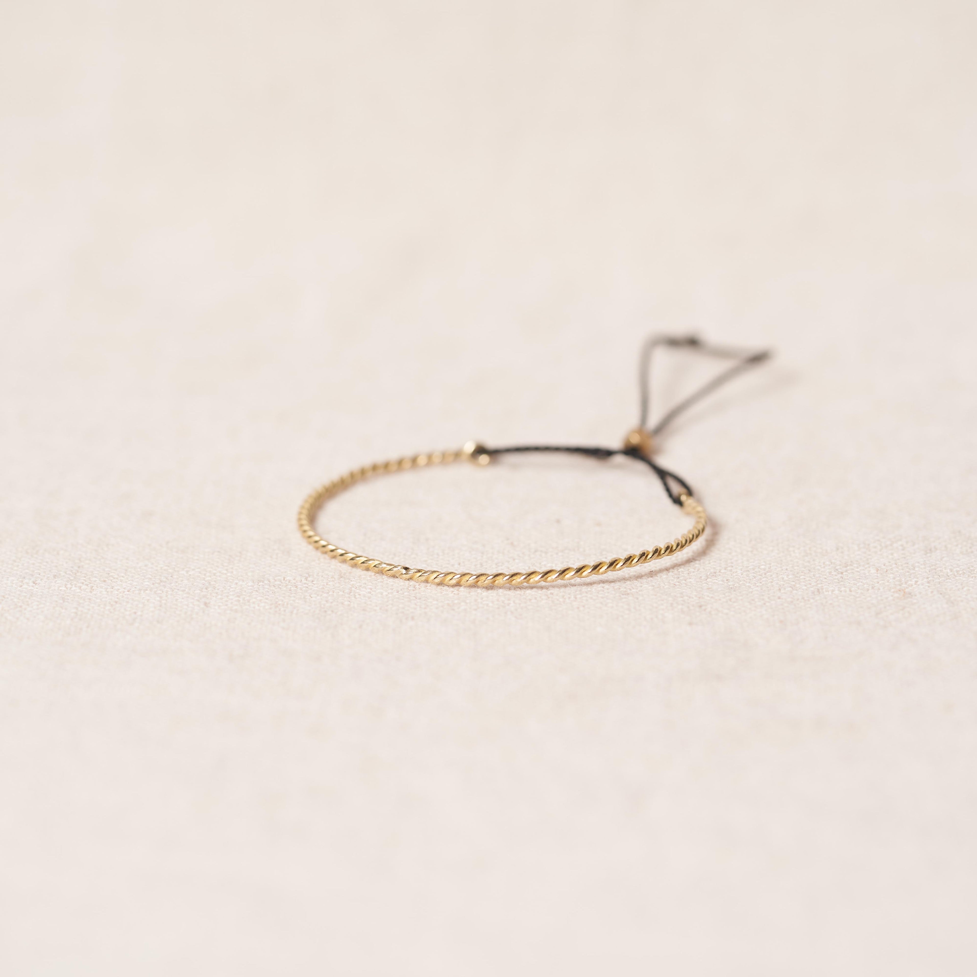 Open twist bracelet in bronze