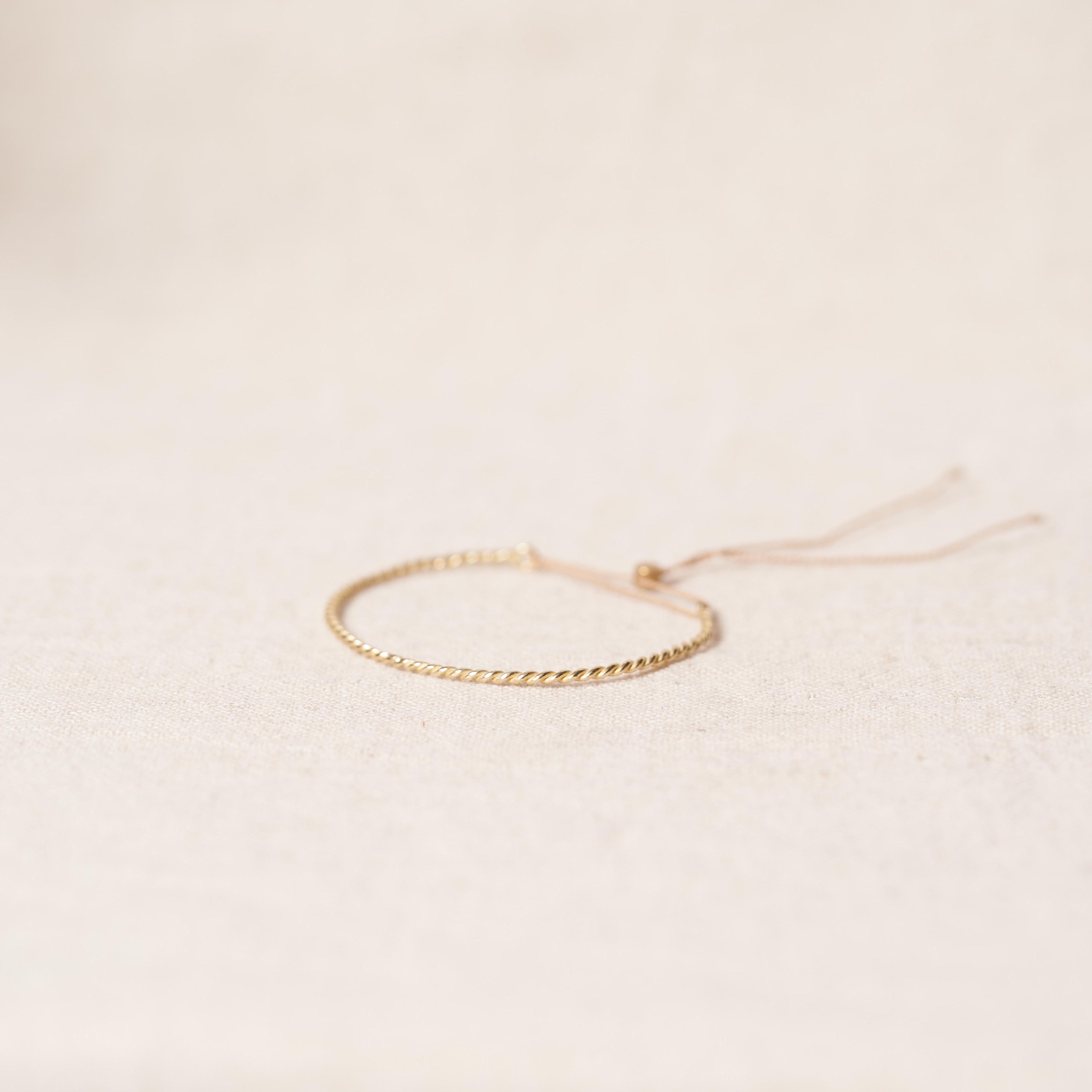 Open twist bracelet in bronze