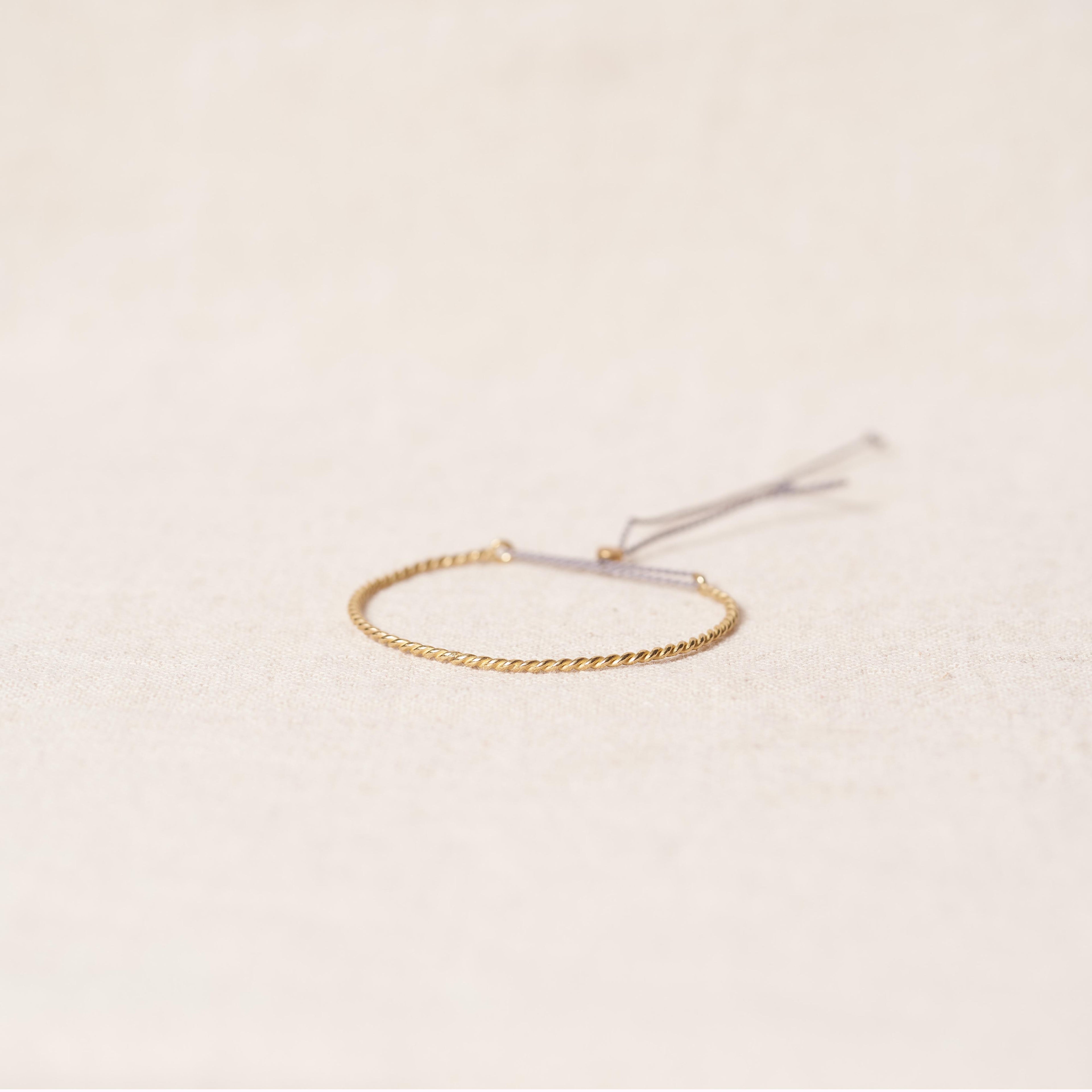 Open twist bracelet in bronze