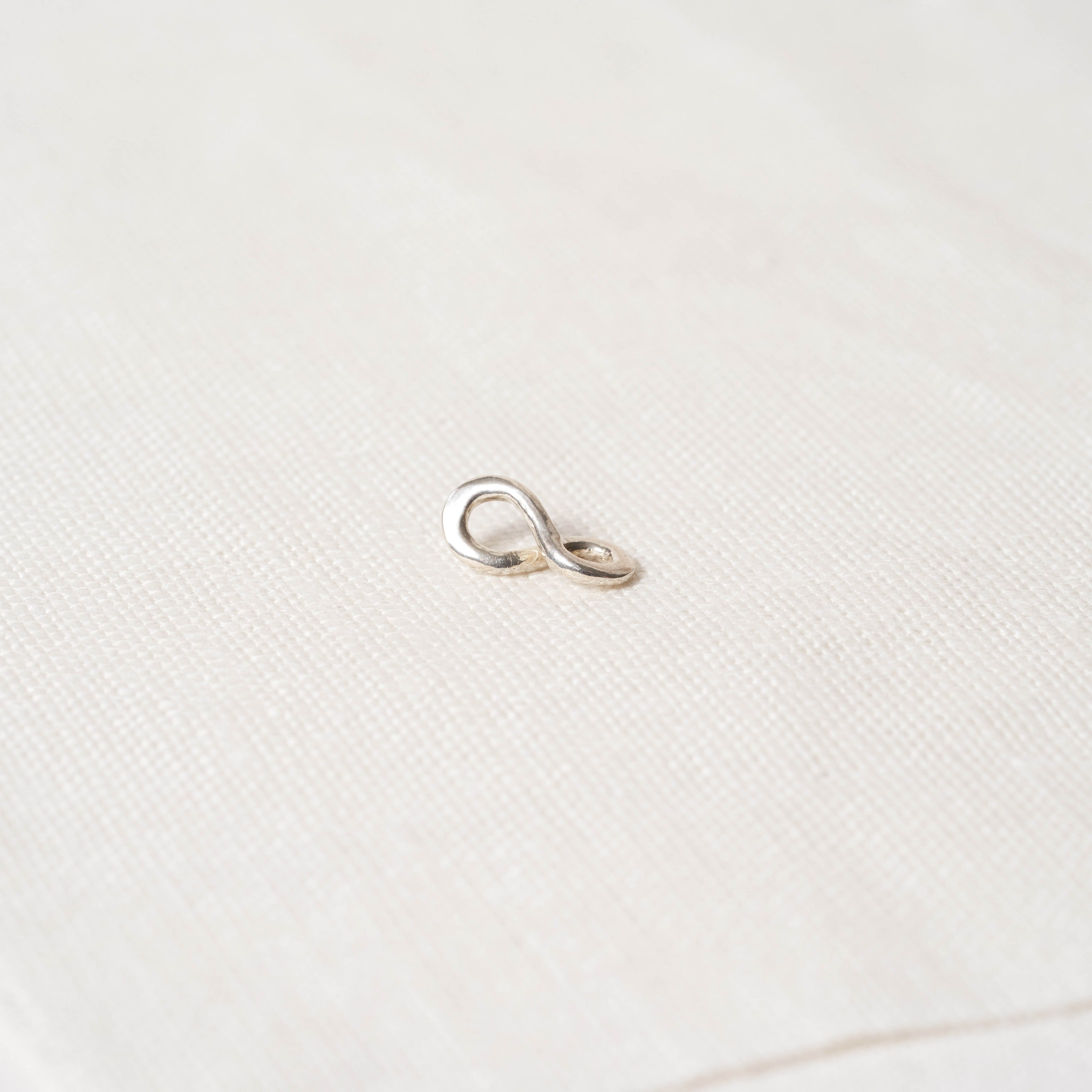 Infinity charm