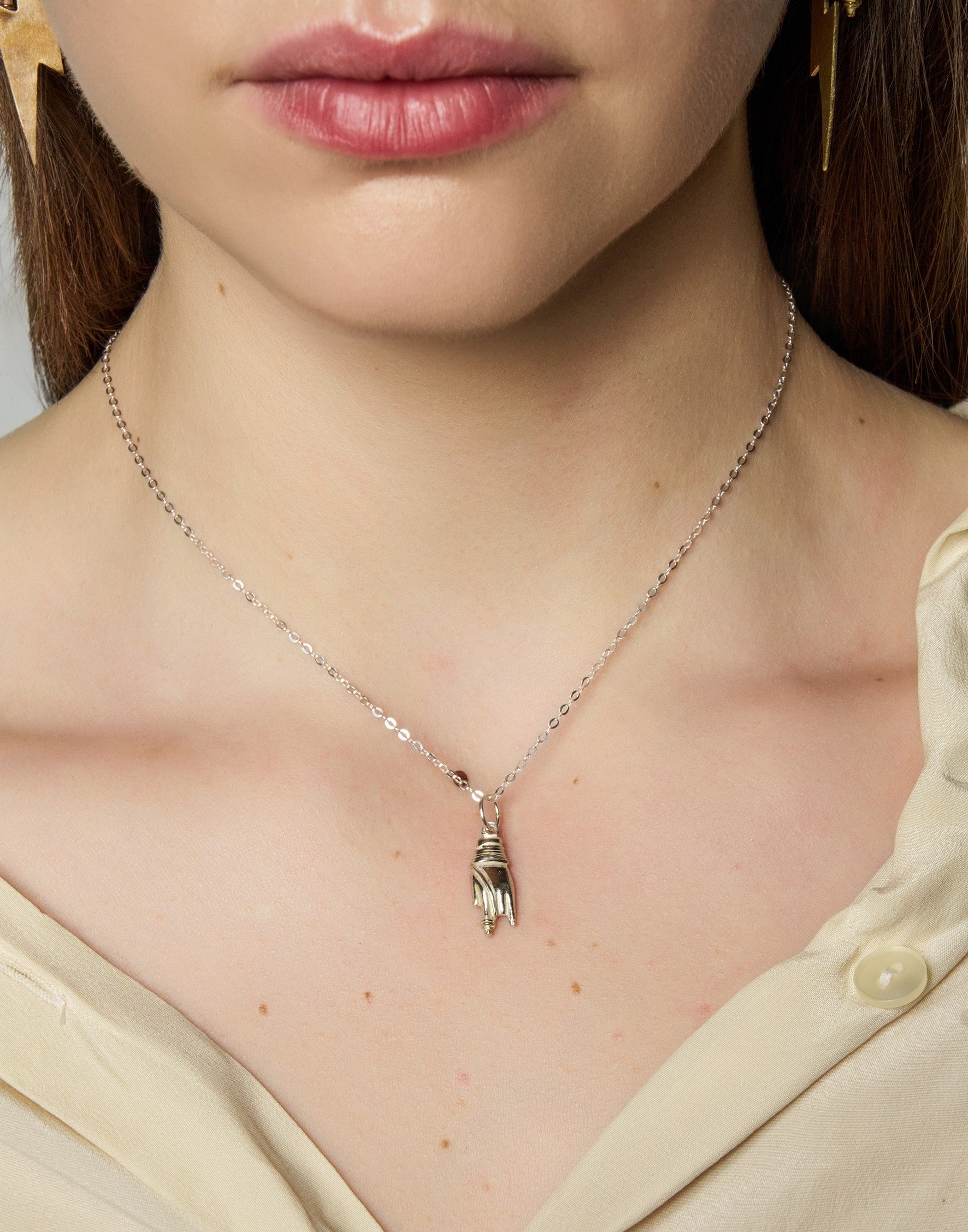 Hand charm